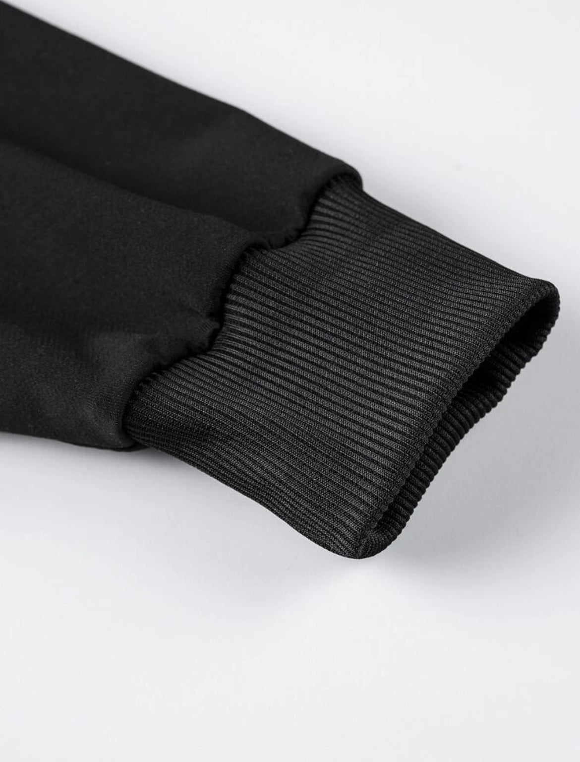 Close Up Of Men's Black Cotton Hoodie Sleeve