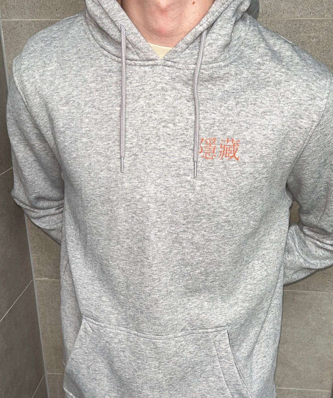 Grey China Hoodie Model Hands Behind Back